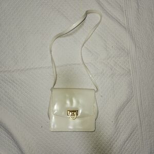 3/$30 Vintage Cream Crossbody Bag with Glossy Finish